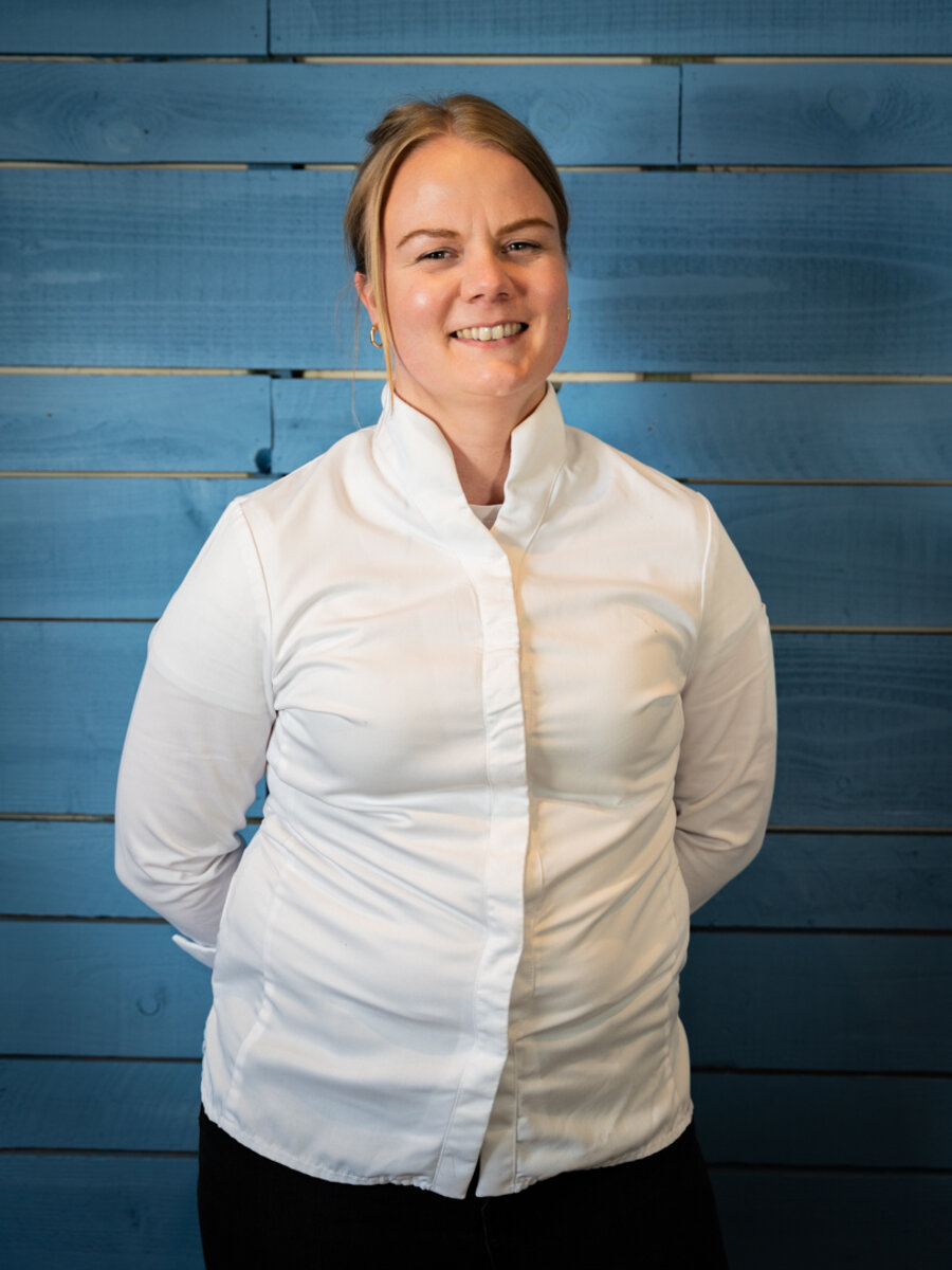 Laura Kimber, Head Chef and Director of The Lloyd, in chef whites.